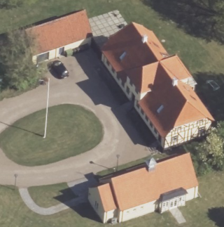 Skråfoto af meningshedshuset